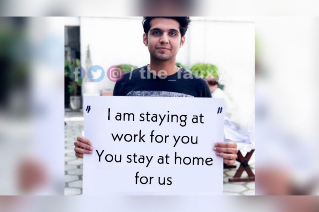 Dentist holding “we are at work for u, u stay at home for us” placard arrested